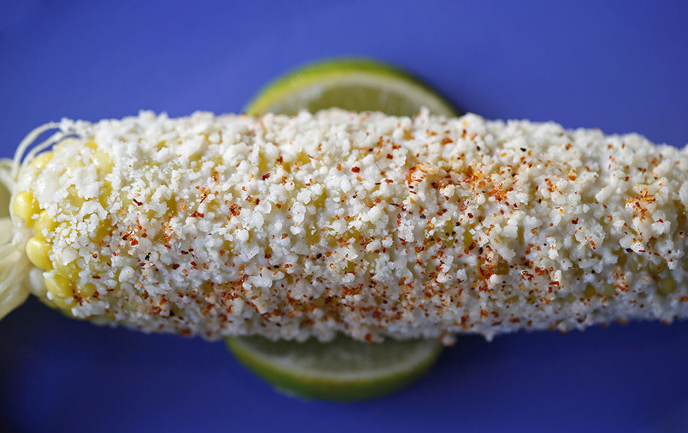 Illustration - 2nd place   - Elote at Iguanas Fresh Mexican Grill in Columbus. (Kyle Robertson / The Columbus Dispatch)